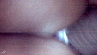 African babe with tattoos enjoys riding a white cock