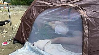 College student makes amateur porn outdoors in a tent with voice play and restraint