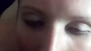 Lena Starr gets cum in her eye in an interracial scene