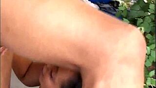 Beautiful black beauty gets a big black cock in her mouth