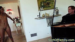 Black beauty in stockings gets fucked by the piano, doggystyle