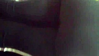 Folding clothes with a great view of the ass